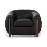 Featuring Lyla Chair - Heirloom Black by Four Hands at Amethyst Home. This updated take on the traditional tub chair pairs rich black top-grain leather with solid ash to shape a sculpted seat with exaggerated depth. Sourced from one of the oldest family-owned tanneries in Italyâ€™s Bassano del Grappa, heirloom leather is salvaged and processed from upcycled hides featuring an abundan. Amethyst Home provides interior design, new construction, custom furniture, and area rugs in the Miami metro area.