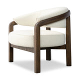 This floating wrap chair features an exposed wood profile that cradles seat and back cushions. The frame feels fluid, as it travels from the ground to the upholstered back rest and back down through the hind legs. Spring suspension ensures stylish comfort.Collection: Farro Amethyst Home provides interior design, new home construction design consulting, vintage area rugs, and lighting in the Washington metro area.