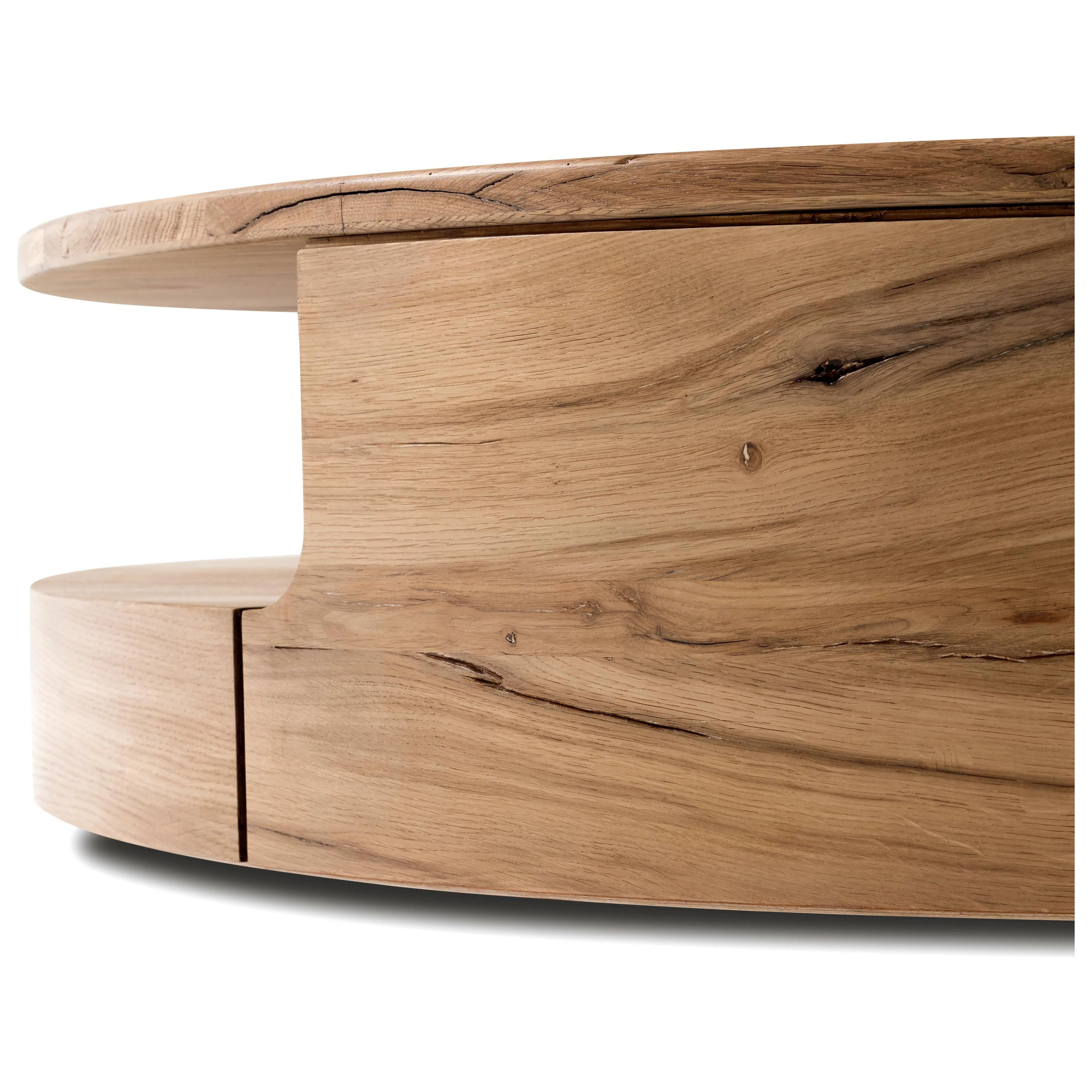 Featuring Matheus Natural Reclaimed French Coffee Table by Four Hands at Amethyst Home. Designed in partnership with longtime Four Hands collaborator Thomas Bina and Brazilian designer Ronald Sasson. A rounded coffee table made from reclaimed French oak, features beautiful natural graining. Lower layer lightens the whole look, while brining the option for . Amethyst Home provides interior design, new home construction design consulting, vintage area rugs, and lighting in the Washington metro area.