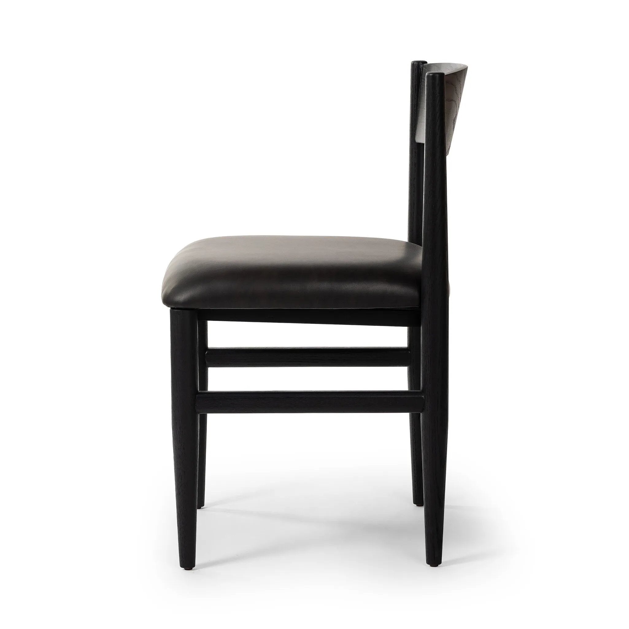Featuring Mavery Sierra Espresso Armless Dining Chair by Four Hands at Amethyst Home. Classic midcentury form meets monochromatic comfort. The tapered-leg design of this oak dining chair is finished with an espresso-brown upholstered cushion for a sleek, inviting seat.
Collection: AshfordColors: Sierra Espresso, Brushed Ebony Oak, Brushed Ebony Oak VeneerMater. Amethyst Home provides interior design, new home construction design consulting, vintage area rugs, and lighting in the Dallas metro area.