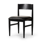 Featuring Mavery Sierra Espresso Armless Dining Chair by Four Hands at Amethyst Home. Classic midcentury form meets monochromatic comfort. The tapered-leg design of this oak dining chair is finished with an espresso-brown upholstered cushion for a sleek, inviting seat.
Collection: AshfordColors: Sierra Espresso, Brushed Ebony Oak, Brushed Ebony Oak VeneerMate. Amethyst Home provides interior design, new home construction design consulting, vintage area rugs, and lighting in the Houston metro area.