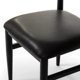 Featuring Mavery Sierra Espresso Armless Dining Chair by Four Hands at Amethyst Home. Classic midcentury form meets monochromatic comfort. The tapered-leg design of this oak dining chair is finished with an espresso-brown upholstered cushion for a sleek, inviting seat.
Collection: AshfordColors: Sierra Espresso, Brushed Ebony Oak, Brushed Ebony Oak Vene. Amethyst Home provides interior design, new home construction design consulting, vintage area rugs, and lighting in the Newport Beach metro area.