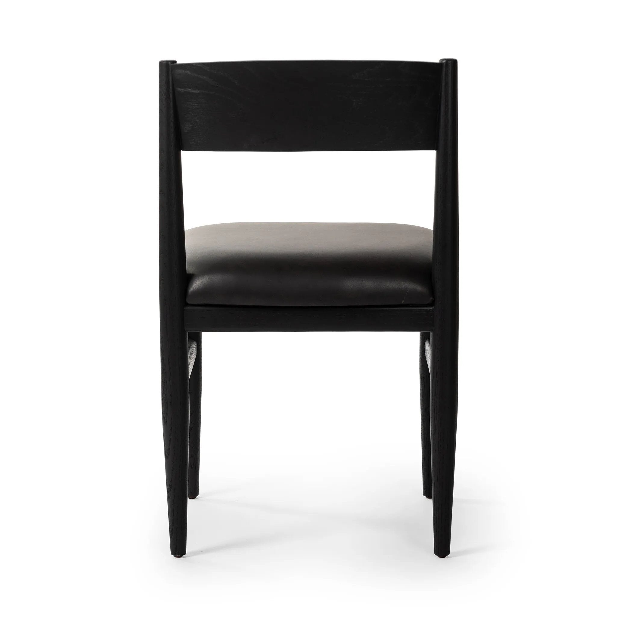 Featuring Mavery Sierra Espresso Armless Dining Chair by Four Hands at Amethyst Home. Classic midcentury form meets monochromatic comfort. The tapered-leg design of this oak dining chair is finished with an espresso-brown upholstered cushion for a sleek, inviting seat.
Collection: AshfordColors: Sierra Espresso, Brushed Ebony Oak, Brushed Ebony Oak Ven. Amethyst Home provides interior design, new home construction design consulting, vintage area rugs, and lighting in the Salt Lake City metro area.
