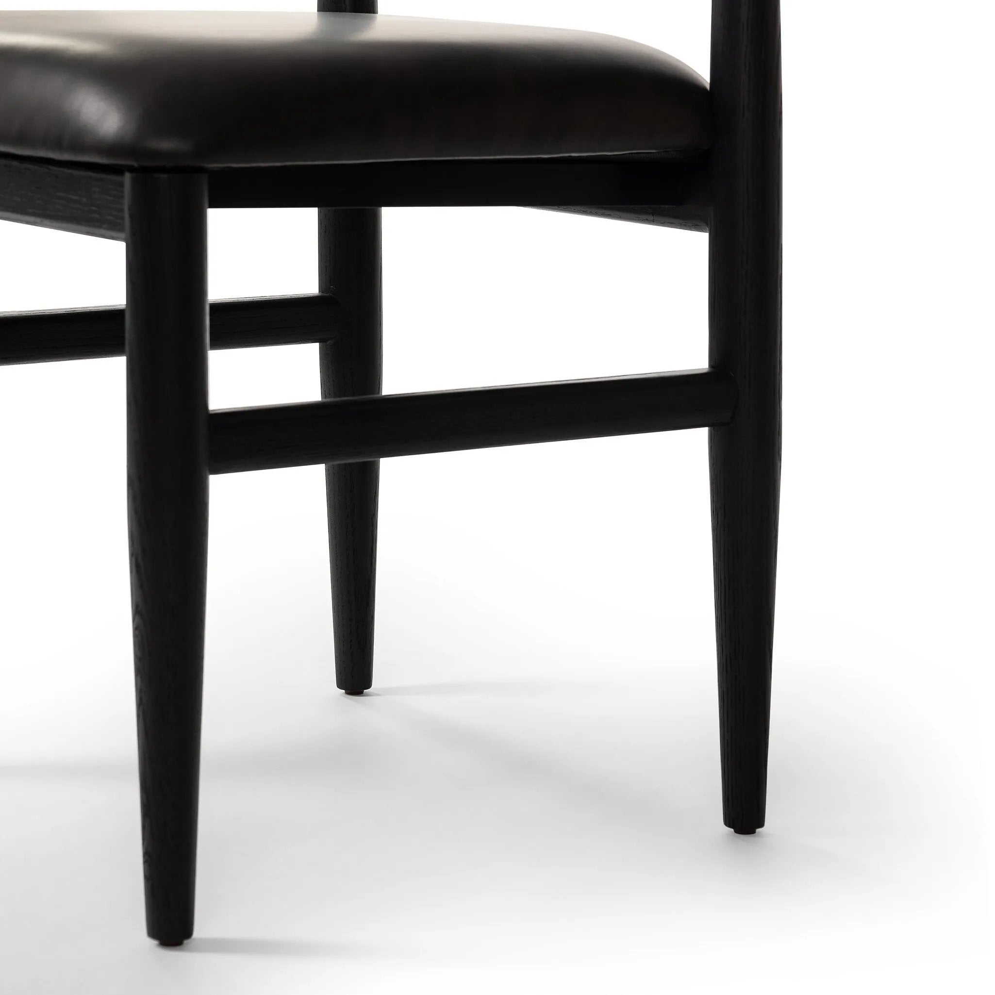 Featuring Mavery Sierra Espresso Armless Dining Chair by Four Hands at Amethyst Home. Classic midcentury form meets monochromatic comfort. The tapered-leg design of this oak dining chair is finished with an espresso-brown upholstered cushion for a sleek, inviting seat.
Collection: AshfordColors: Sierra Espresso, Brushed Ebony Oak, Brushed Ebony Oak VeneerMateri. Amethyst Home provides interior design, new home construction design consulting, vintage area rugs, and lighting in the Tampa metro area.