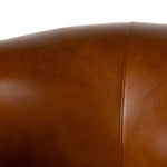 Sultry and sensible. Warm top-grain leather hugs the curves of modern-minded seating, with a hidden swivel for a functional touch. Amethyst Home provides interior design, new construction, custom furniture and area rugs in the Boston metro area
