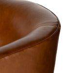 Sultry and sensible. Warm top-grain leather hugs the curves of modern-minded seating, with a hidden swivel for a functional touch. Amethyst Home provides interior design, new construction, custom furniture and area rugs in the Calabasas metro area
