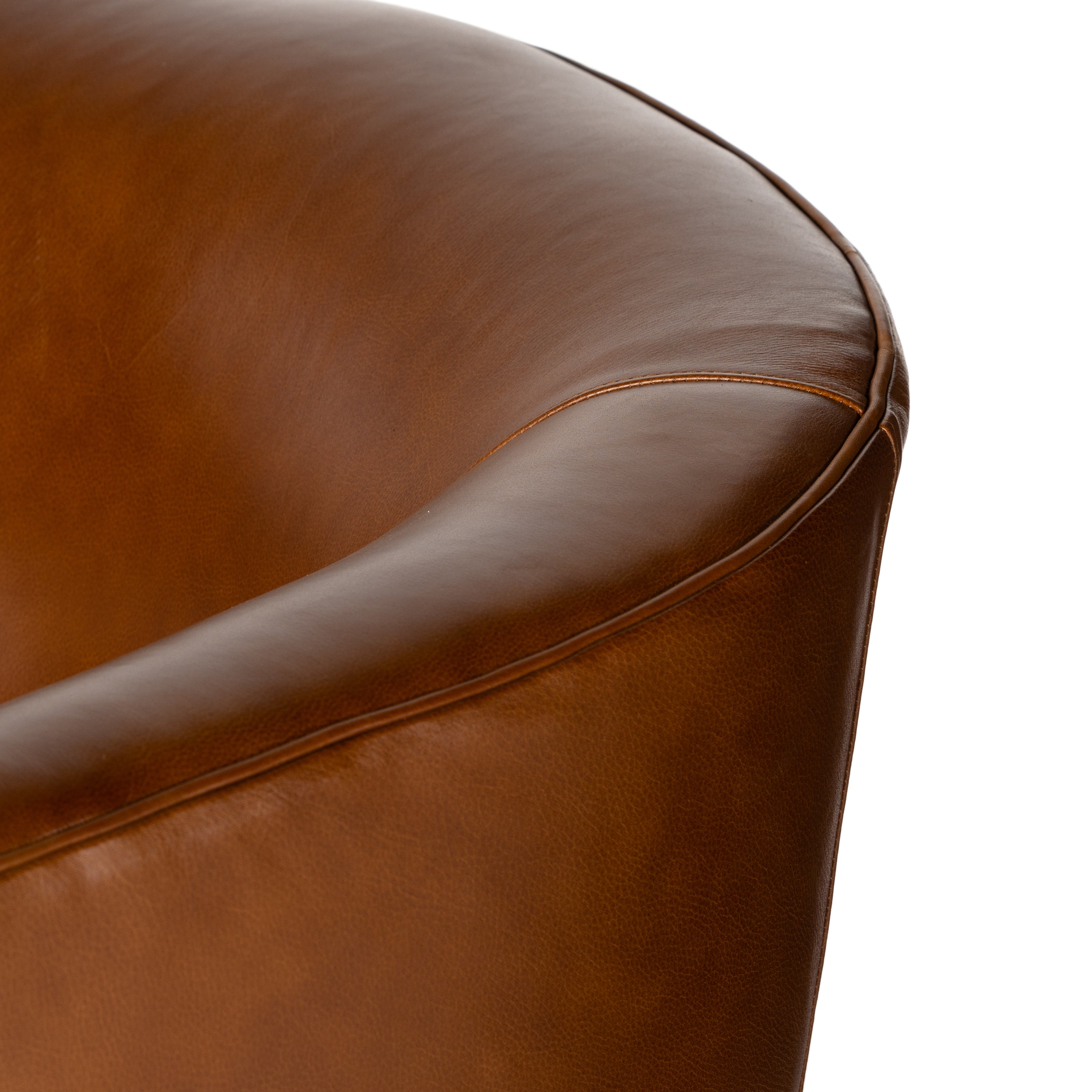 Sultry and sensible. Warm top-grain leather hugs the curves of modern-minded seating, with a hidden swivel for a functional touch. Amethyst Home provides interior design, new construction, custom furniture and area rugs in the Calabasas metro area
