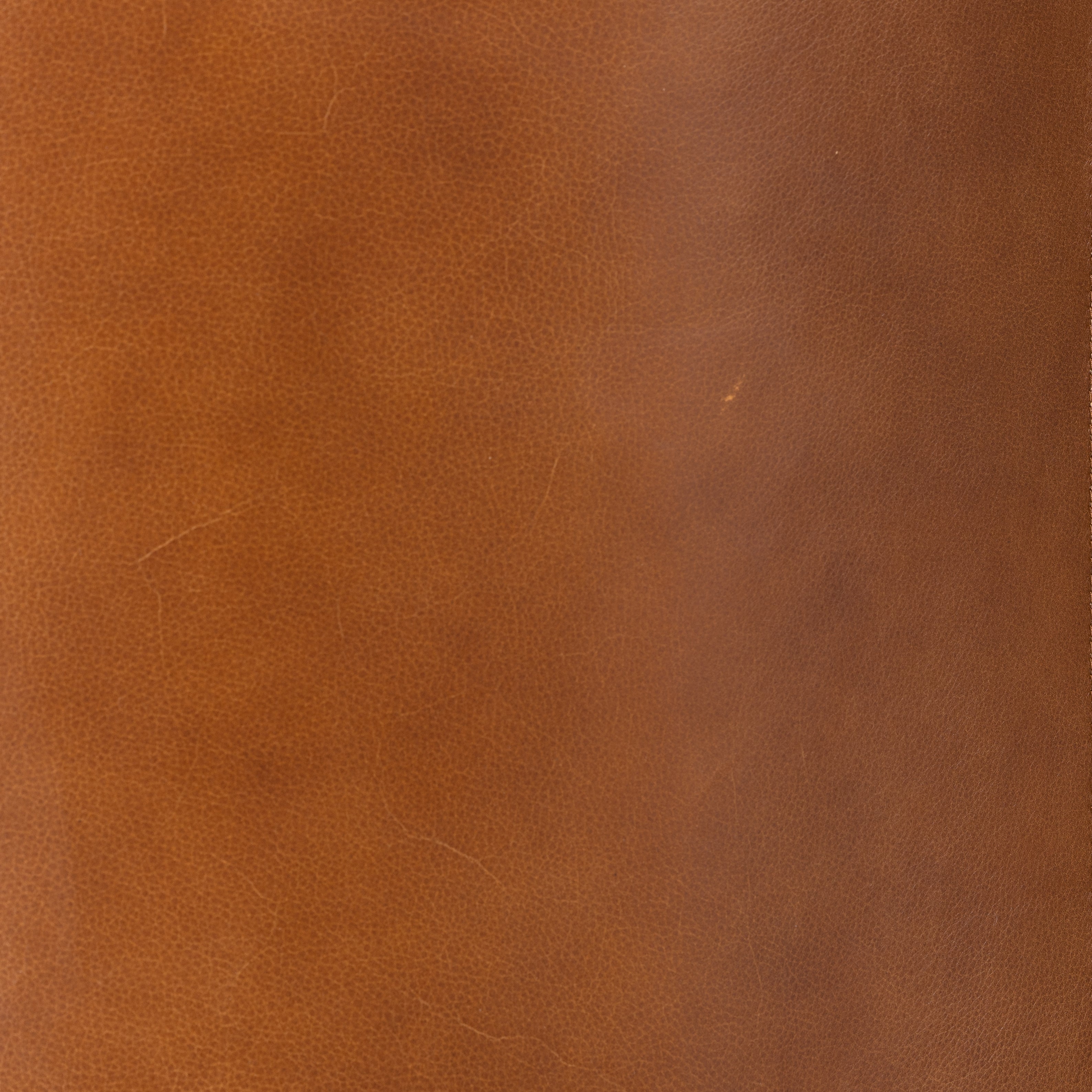 Sultry and sensible. Warm top-grain leather hugs the curves of modern-minded seating, with a hidden swivel for a functional touch. Amethyst Home provides interior design, new construction, custom furniture and area rugs in the Laguna Beach metro area