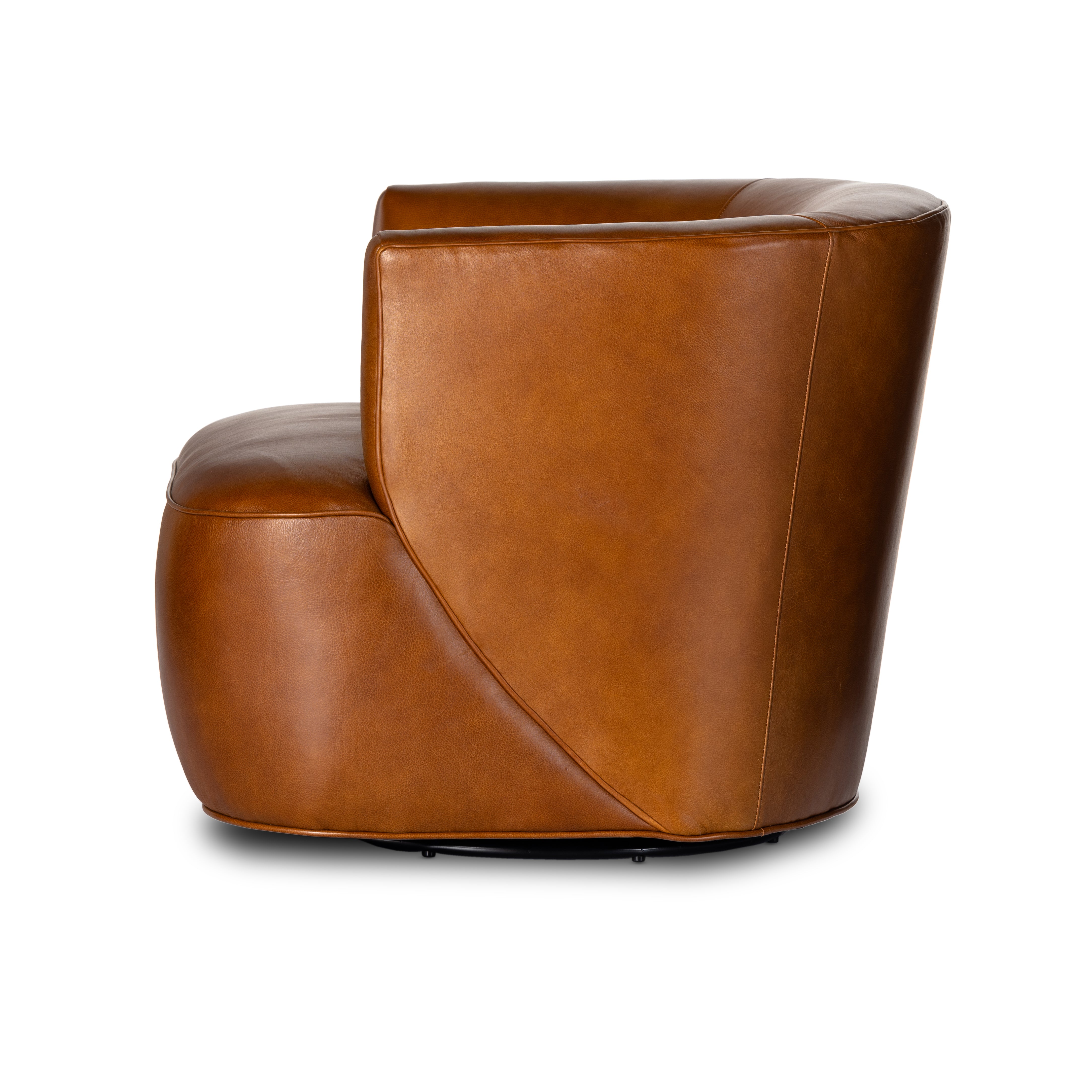 Sultry and sensible. Warm top-grain leather hugs the curves of modern-minded seating, with a hidden swivel for a functional touch. Amethyst Home provides interior design, new construction, custom furniture and area rugs in the Newport Beach metro area