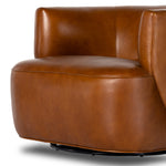 Sultry and sensible. Warm top-grain leather hugs the curves of modern-minded seating, with a hidden swivel for a functional touch. Amethyst Home provides interior design, new construction, custom furniture and area rugs in the Newport Beach metro area