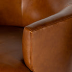Sultry and sensible. Warm top-grain leather hugs the curves of modern-minded seating, with a hidden swivel for a functional touch. Amethyst Home provides interior design, new construction, custom furniture and area rugs in the Washington metro area