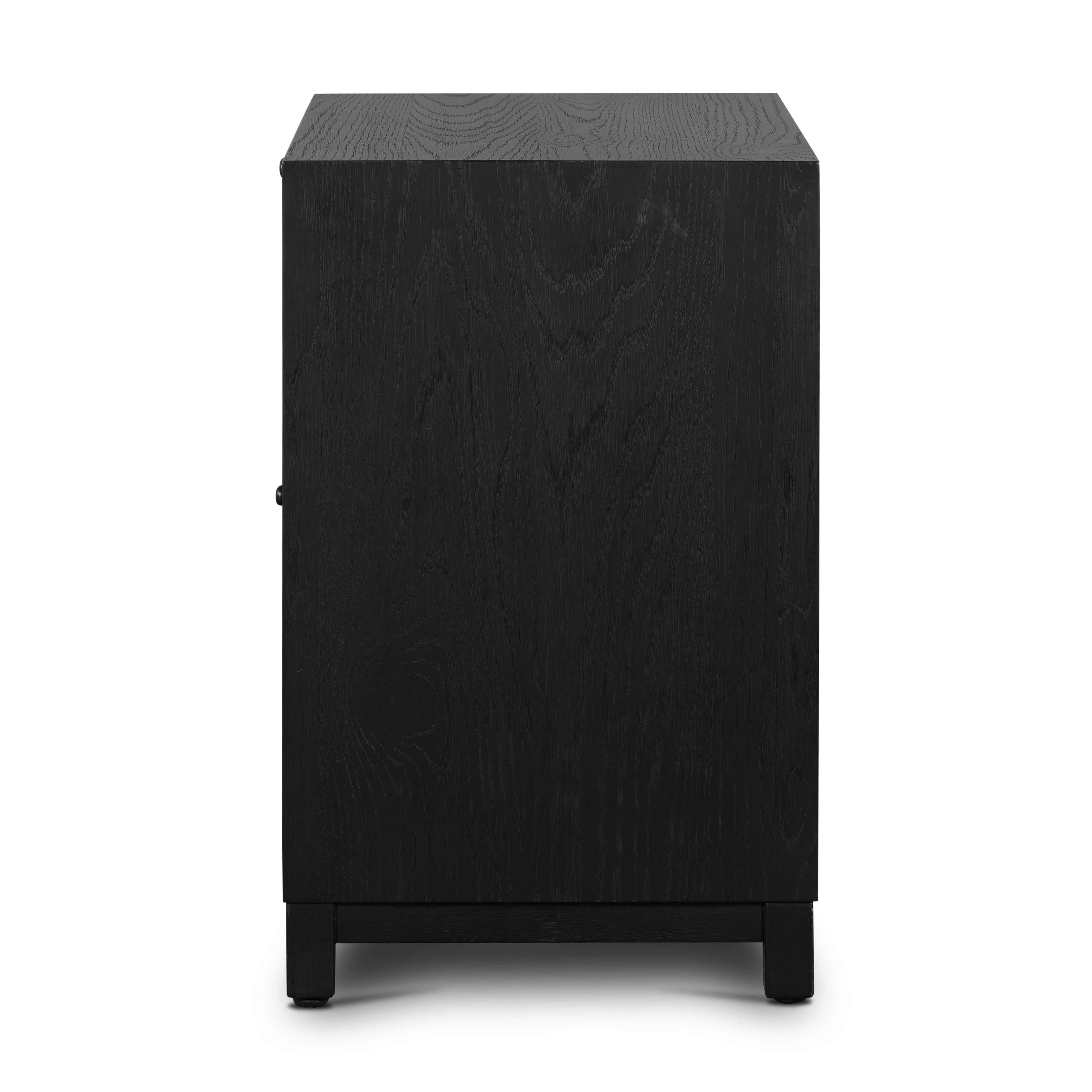 Featuring Millie Drifted Matte Black Nightstand by Four Hands at Amethyst Home. The Millie Drifted Matte Black Nightstand is perfect for adding a touch of modern charm to your home. With its drifted matte black veneer, solid parawood and iron accents, this nightstand brings a sophisticated style to any bedroom. Plus, the antique pewter and drifted oak co. Amethyst Home provides interior design, new home construction design consulting, vintage area rugs, and lighting in the Laguna Beach metro area.