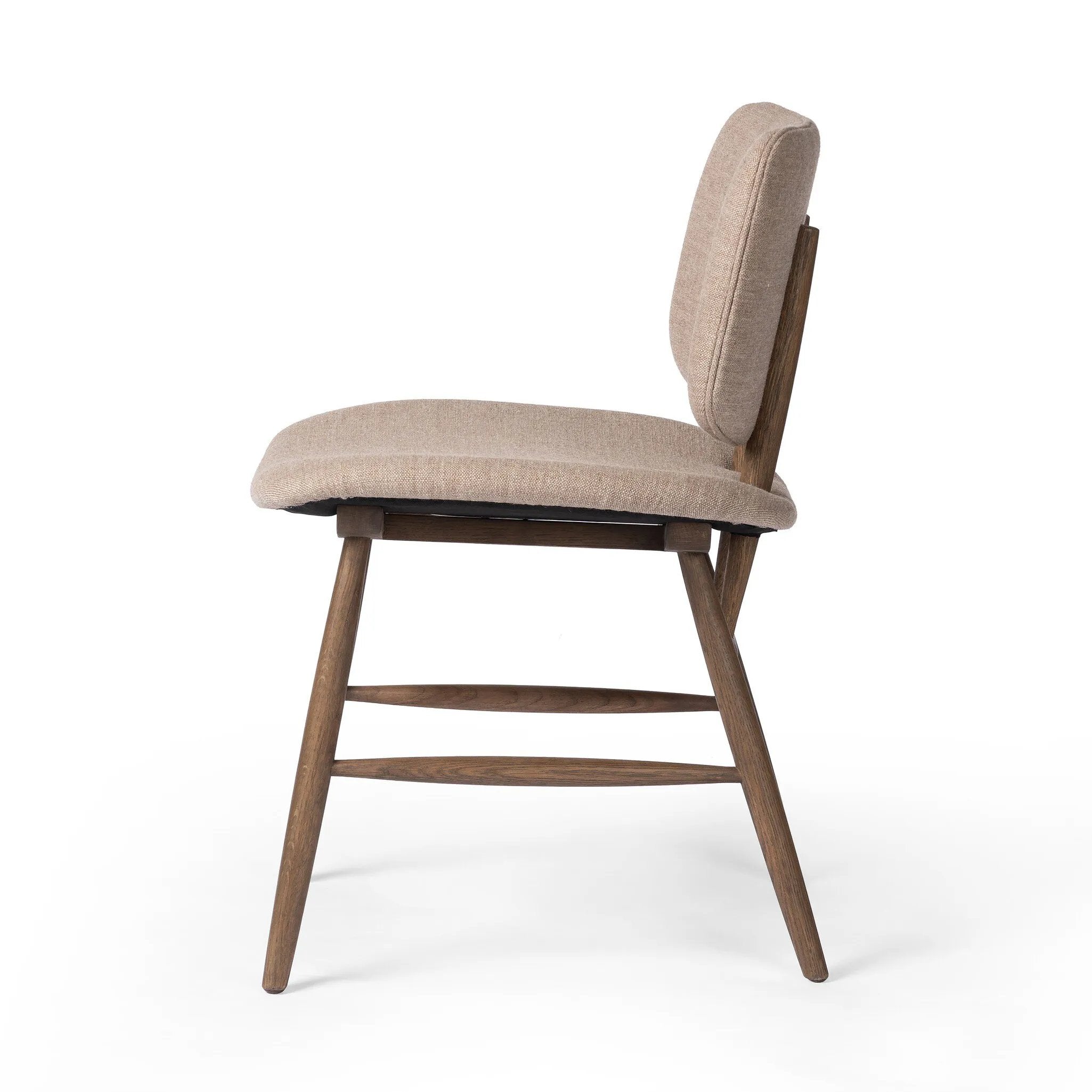 Featuring Montague Alcala Fawn Dining Chair by Four Hands at Amethyst Home. A textbook midcentury design with upholstered molded cushions pair style and comfort in one dining chair. Alternating joint positions add an unexpected architectural element to the piece. Performance fabrics are specially created to withstand spills, stains, high traffic and wear, e. Amethyst Home provides interior design, new home construction design consulting, vintage area rugs, and lighting in the San Diego metro area.