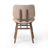 Featuring Montague Alcala Fawn Dining Chair by Four Hands at Amethyst Home. A textbook midcentury design with upholstered molded cushions pair style and comfort in one dining chair. Alternating joint positions add an unexpected architectural element to the piece. Performance fabrics are specially created to withstand spills, stains, high traffic and wear, . Amethyst Home provides interior design, new home construction design consulting, vintage area rugs, and lighting in the Scottsdale metro area.