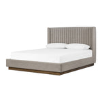 Featuring Montgomery Bed by Four Hands at Amethyst Home. The Montgomery Bed is a tall, vertical-channeled headboard that is upholstered in grey high-performance fabric for a sensible take on modern bedroom styling. A parawood plinth base grounds the whole look. Performance fabrics are specially created to withstand spills, stains, high traffic and wear, ensuring long-term comfort and unmat. Amethyst Home provides interior design services, furniture, rugs, and lighting in the Calabasas metro area. 