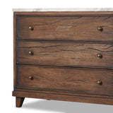 Featuring Odette Antique Belgium Bleach Marble Nightstand by Four Hands at Amethyst Home. Capturing the charm of vintage French storage, this solid mango wood nightstand stands tall with a polished marble top and softened ogee edges. Three spacious drawers are fitted with classic brass-button hardware. Natural marks and cracks are characteristic of the rec. Amethyst Home provides interior design, new home construction design consulting, vintage area rugs, and lighting in the Alpharetta metro area.