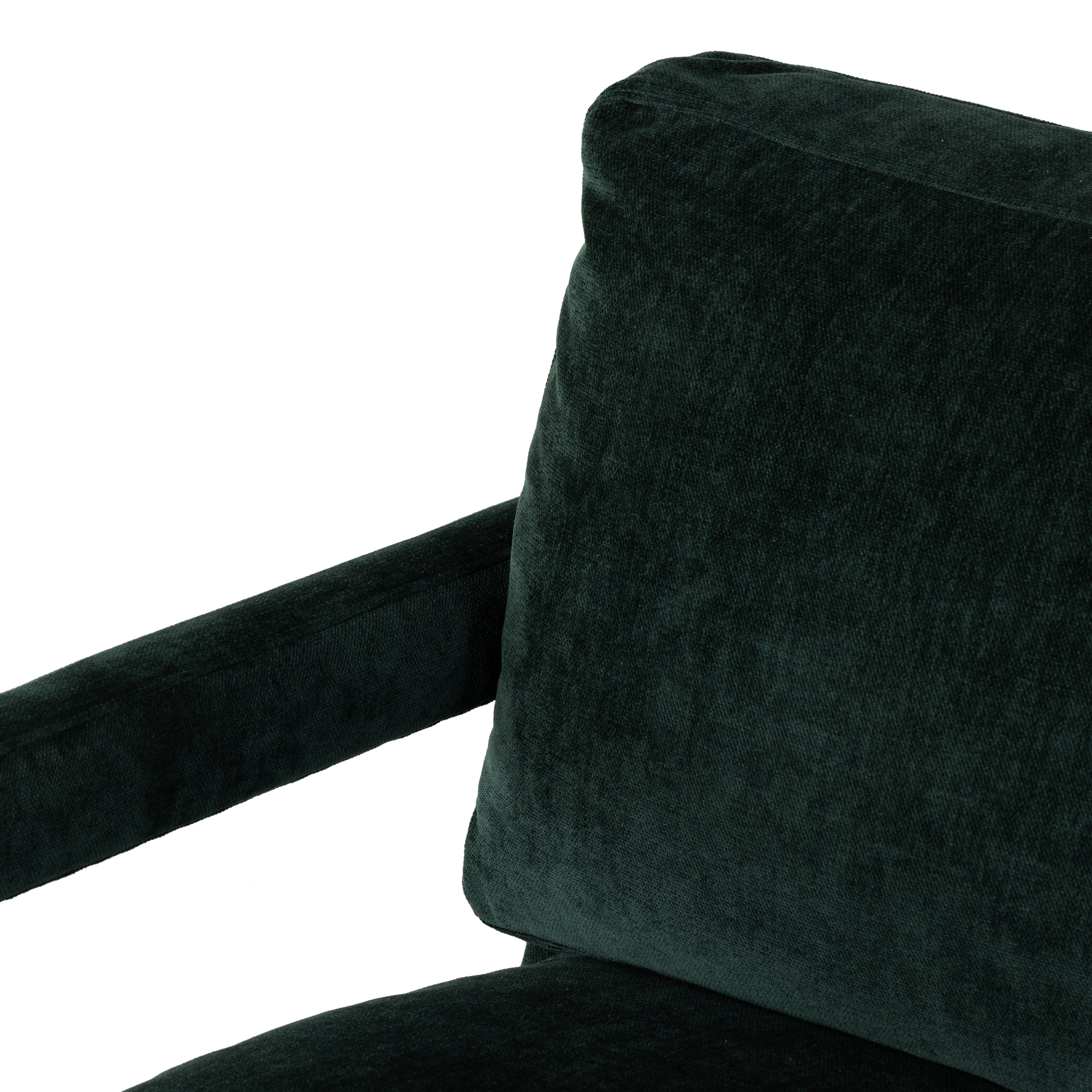 Work some color into your mix with low, structured seating upholstered in an emerald performance fabric â€“ all atop a 360-degree swivel. Performance fabrics are specially created to withstand spills, stains, high traffic and wear, ensuring long-term comfort and unmatched durability. Amethyst Home provides interior design, new construction, custom furniture, and area rugs in the Charlotte metro area.