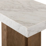 Structured and geometric, an open-style console table pairs smoked oak veneer with white marble, for a sophisticated material mix.Collection: Hughe Amethyst Home provides interior design, new home construction design consulting, vintage area rugs, and lighting in the Los Angeles metro area.