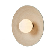 Featuring Organic Light Sand Ceramic Sconce by Four Hands at Amethyst Home. Organic in spirit. A light sand-colored porcelain disc is nestled in a slim iron frame for a spare but impactful look.Overall Dimensions: 7"W x 14"L x 14"H
Collection: RykerColors: Brass ,Opal White Glass ,Light SandMaterials: Iron ,Glass ,Ceramic Weight: 5.16 lbsBulb(s) Included: N. Amethyst Home provides interior design, new home construction design consulting, vintage area rugs, and lighting in the San Diego metro area.