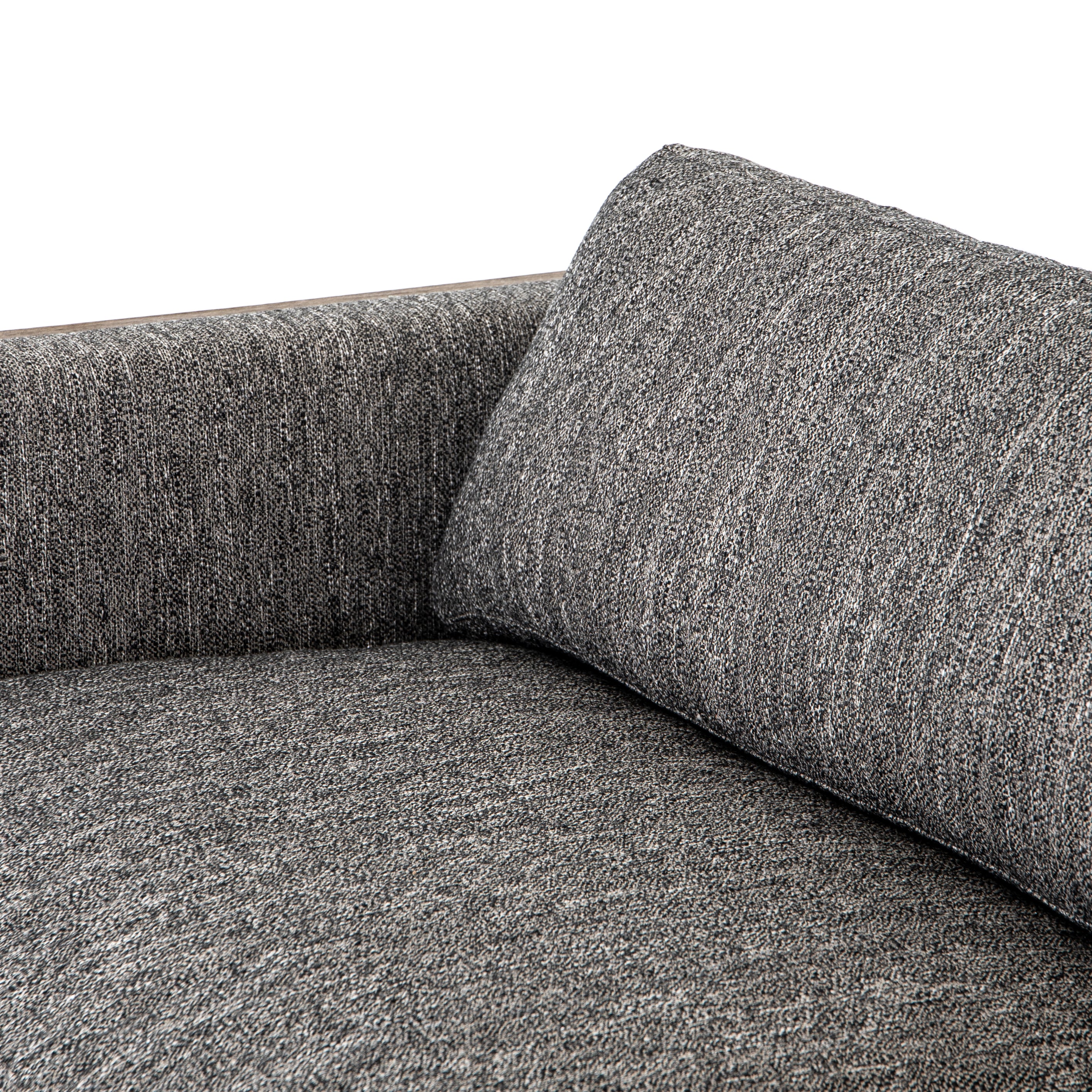 Crisp, clean comfort. Charcoal-colored upholstery of performance grade cradles within an exposed parawood frame, for detail-driven contrast. Performance fabrics are specially created to withstand spills, stains, high traffic and wear, ensuring long-term comfort and unmatched durability. Amethyst Home provides interior design, new construction, custom furniture, and area rugs in the Monterey metro area.