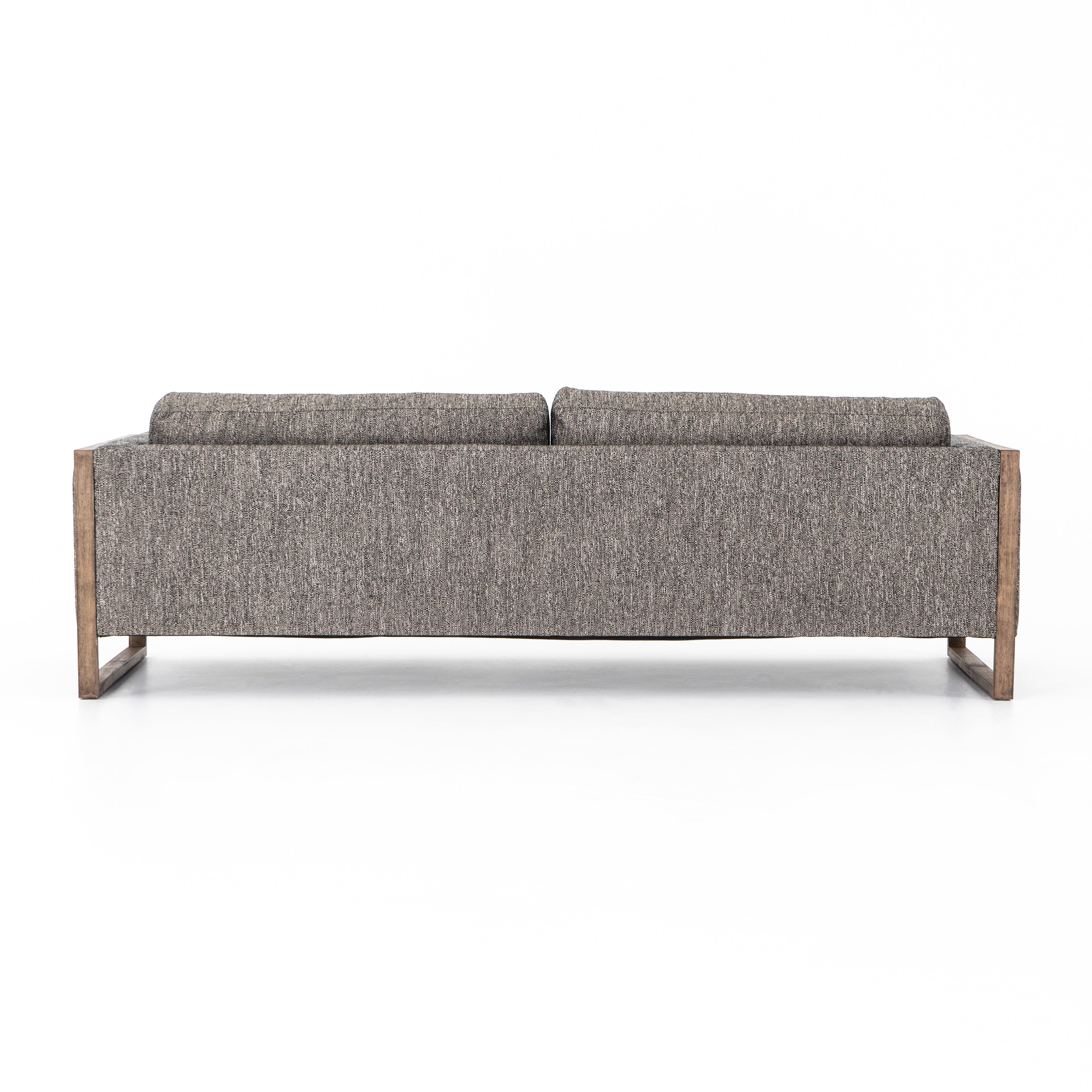 Crisp, clean comfort. Charcoal-colored upholstery of performance grade cradles within an exposed parawood frame, for detail-driven contrast. Performance fabrics are specially created to withstand spills, stains, high traffic and wear, ensuring long-term comfort and unmatched durability. Amethyst Home provides interior design, new construction, custom furniture, and area rugs in the Seattle metro area.