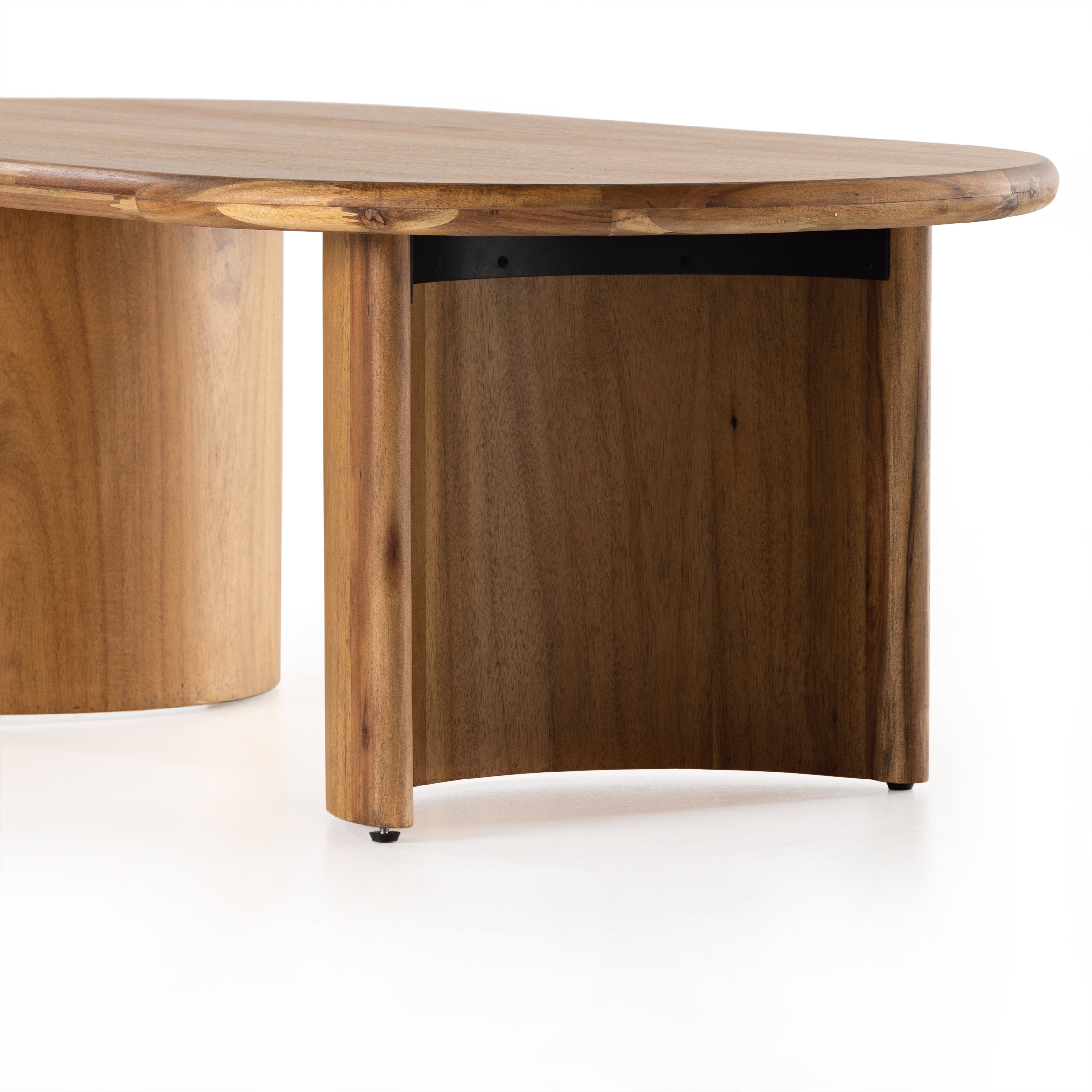 Featuring Paden Sandy Acacia Coffee Table by Four Hands at Amethyst Home. A study in shape. Solid brown acacia forms crescent-shaped legs and sprawling oval tabletop, bringing organic presence to the living room.
Overall Dimensions: 51"W x 27"L x 17"HColors: Sandy AcaciaMaterials: Thin Acacia VeneerWeight: 52.91Volume: 10.03Clearance from Floor: 15.5"Dist. Amethyst Home provides interior design, new home construction design consulting, vintage area rugs, and lighting in the Los Angeles metro area.