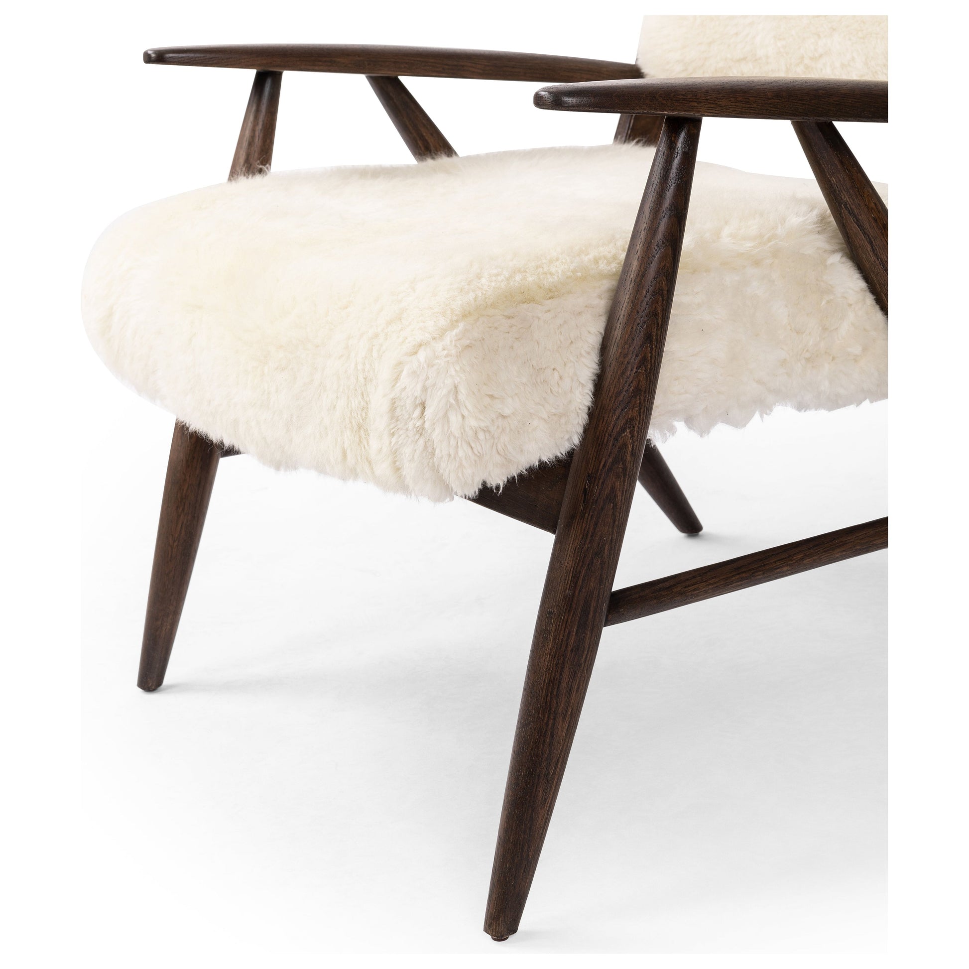 A modern take on the vintage school chair, upholstered in plush cream shearling of 100% sheepskin. Perfect as an accent chair or in pairs. Amethyst Home provides interior design, new construction, custom furniture, and area rugs in the Seattle metro area.