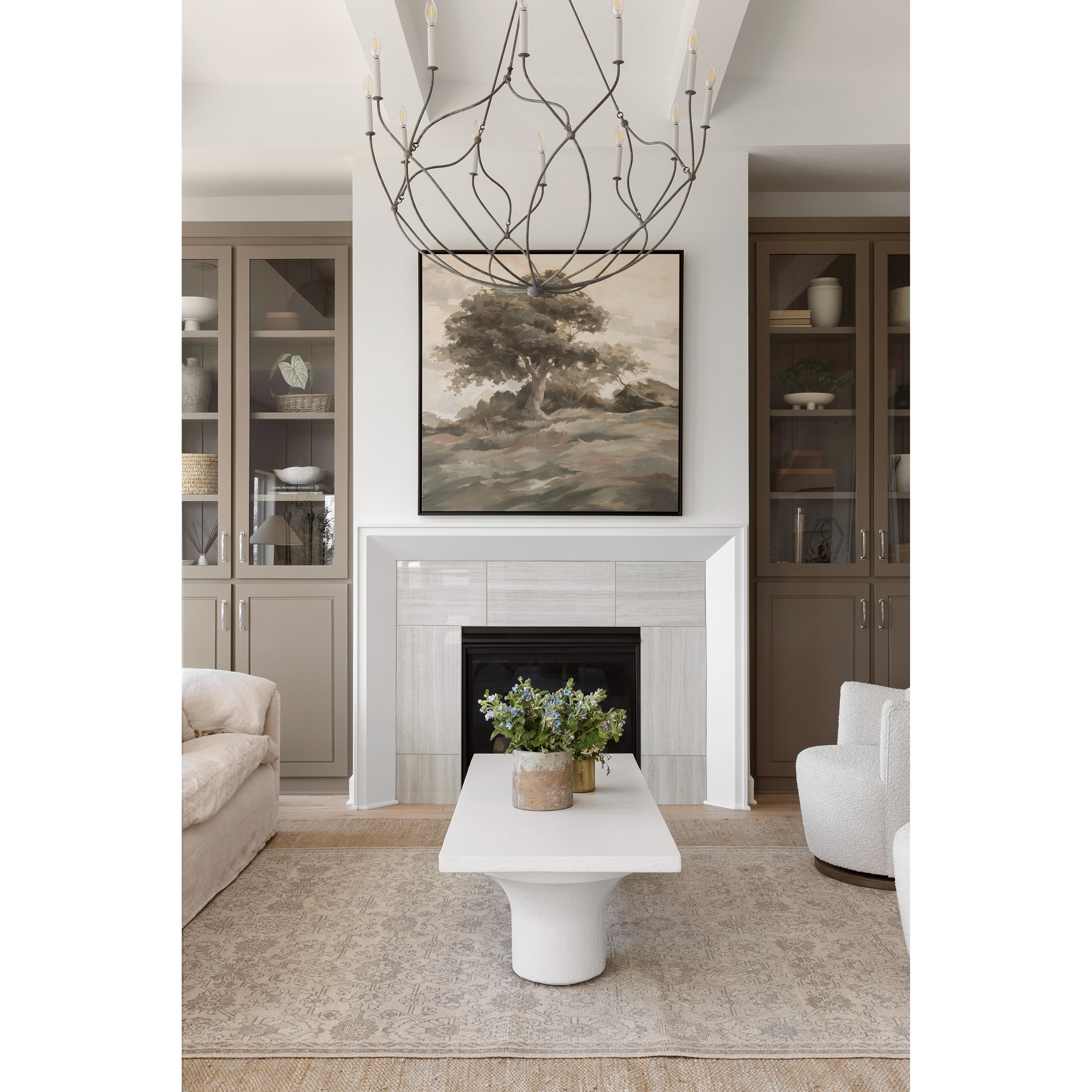 The Parra Coffee Table in Plaster Molded Concrete is a striking addition to any modern farmhouse or coastal home design. The plaster-molded construction adds texture and visual interest, while the Sherwin Williams Library Pewter and SW Pure White color palette complements a variety of interior design styles. Perfect for use in the living room, entry, or office, this coffee table is sure to make a statement.