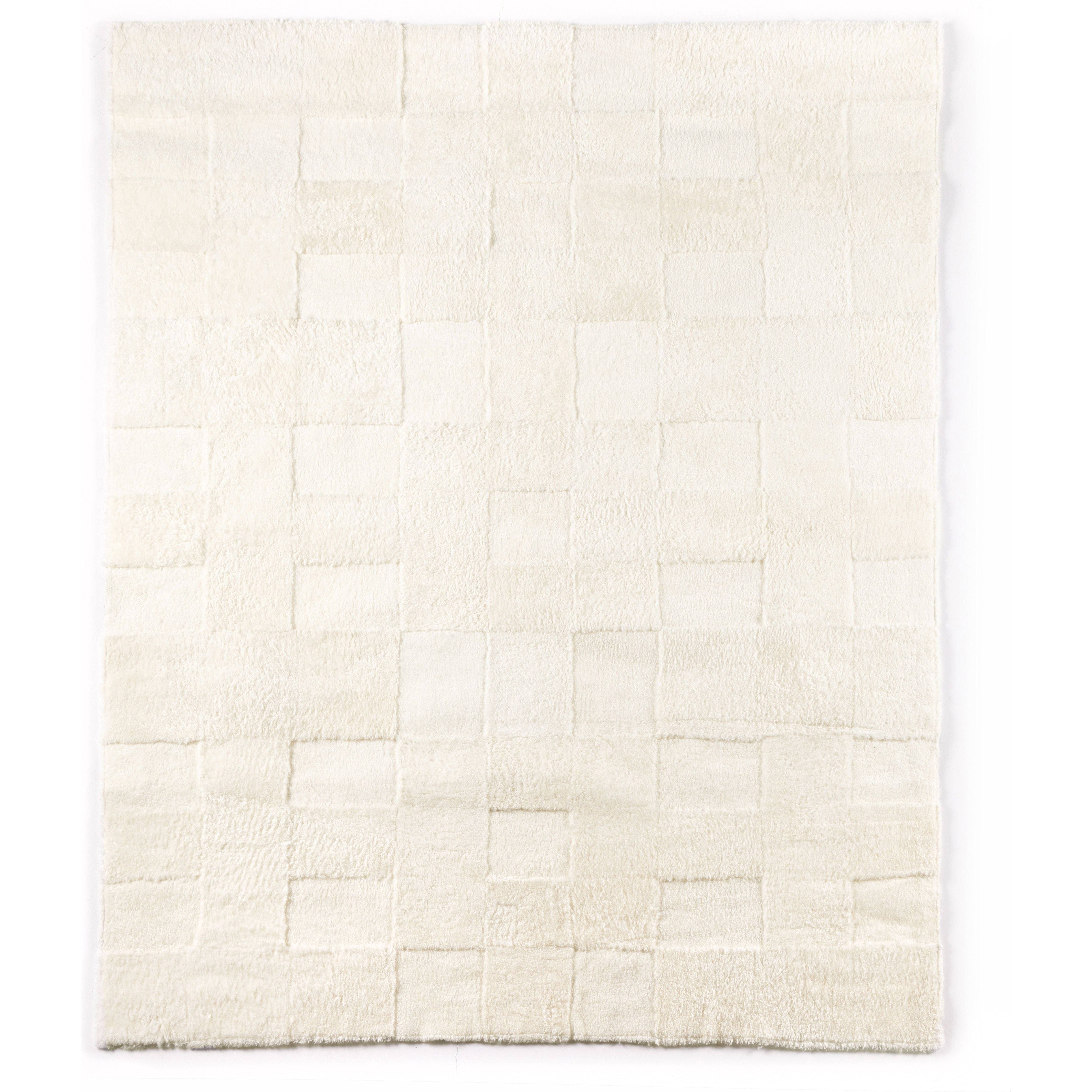 Patchwork Cream Shorn Shearling Rug is shaved to different heights and stitched together to create a tonal checked pattern for a modern yet classic look. Subtle color variations bring a natural, more organic feel to the rug. The material, pattern, and hues come together to craft an unexpected bold style. Amethyst Home provides interior design services, furniture, rugs, and lighting in Des Moines area.