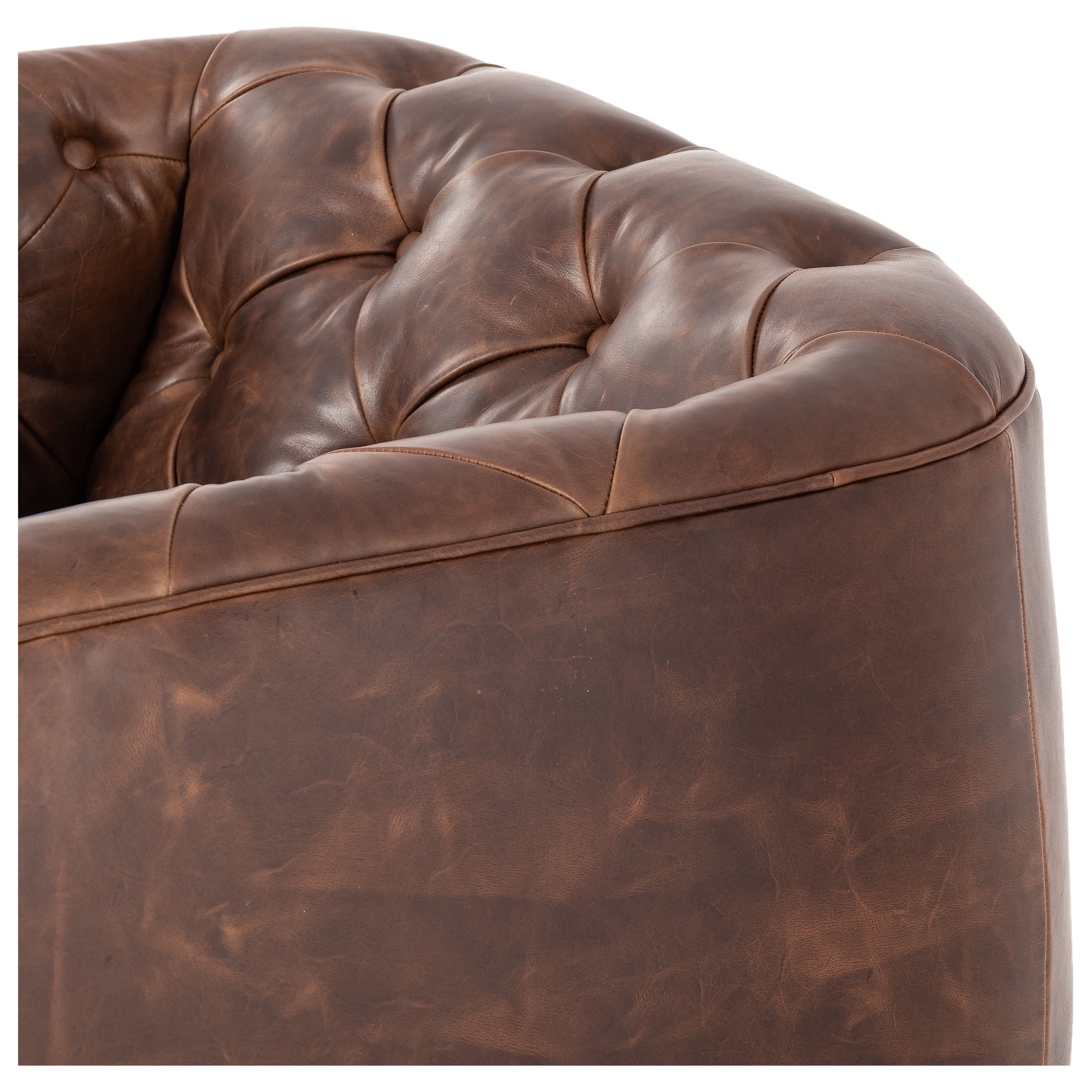 Featuring Paul Raleigh Cigar Swivel Chair by Four Hands at Amethyst Home. Old English-inspired top-grain leather is finished with a soft hand for a vintage, lived-in look on this traditionally inspired chair. Handcrafted in Italy, the richness of this distinctive, full-bodied leather develops an even-richer patina over time. Button tufting texturizes a comfortably curved back and si. Amethyst Home provides interior design, new construction, custom furniture, and area rugs in the Dallas metro area.