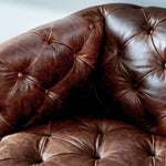 Featuring Paul Raleigh Cigar Swivel Chair by Four Hands at Amethyst Home. Old English-inspired top-grain leather is finished with a soft hand for a vintage, lived-in look on this traditionally inspired chair. Handcrafted in Italy, the richness of this distinctive, full-bodied leather develops an even-richer patina over time. Button tufting texturizes a comfortably curved back a. Amethyst Home provides interior design, new construction, custom furniture, and area rugs in the Los Angeles metro area.