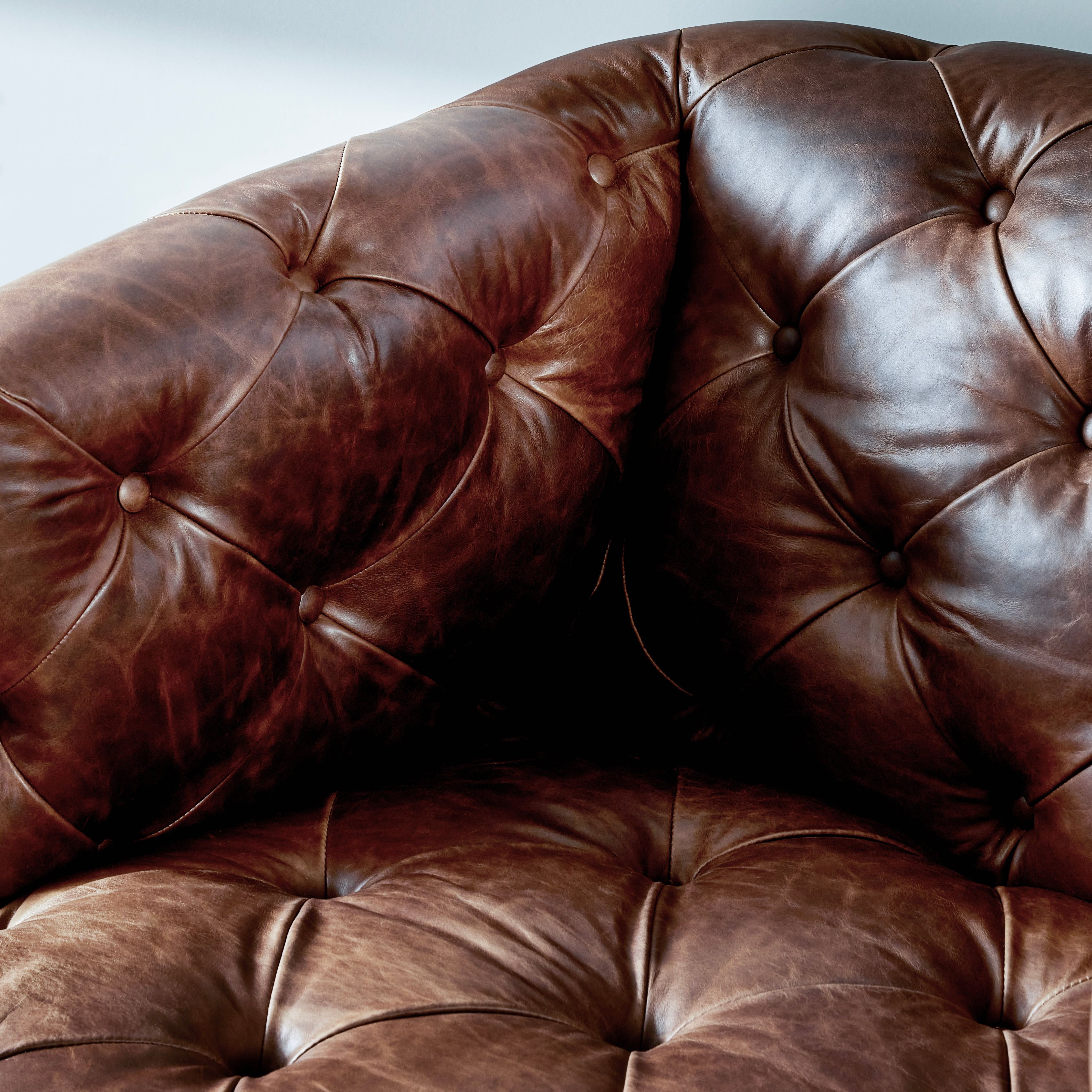 Featuring Paul Raleigh Cigar Swivel Chair by Four Hands at Amethyst Home. Old English-inspired top-grain leather is finished with a soft hand for a vintage, lived-in look on this traditionally inspired chair. Handcrafted in Italy, the richness of this distinctive, full-bodied leather develops an even-richer patina over time. Button tufting texturizes a comfortably curved back a. Amethyst Home provides interior design, new construction, custom furniture, and area rugs in the Los Angeles metro area.