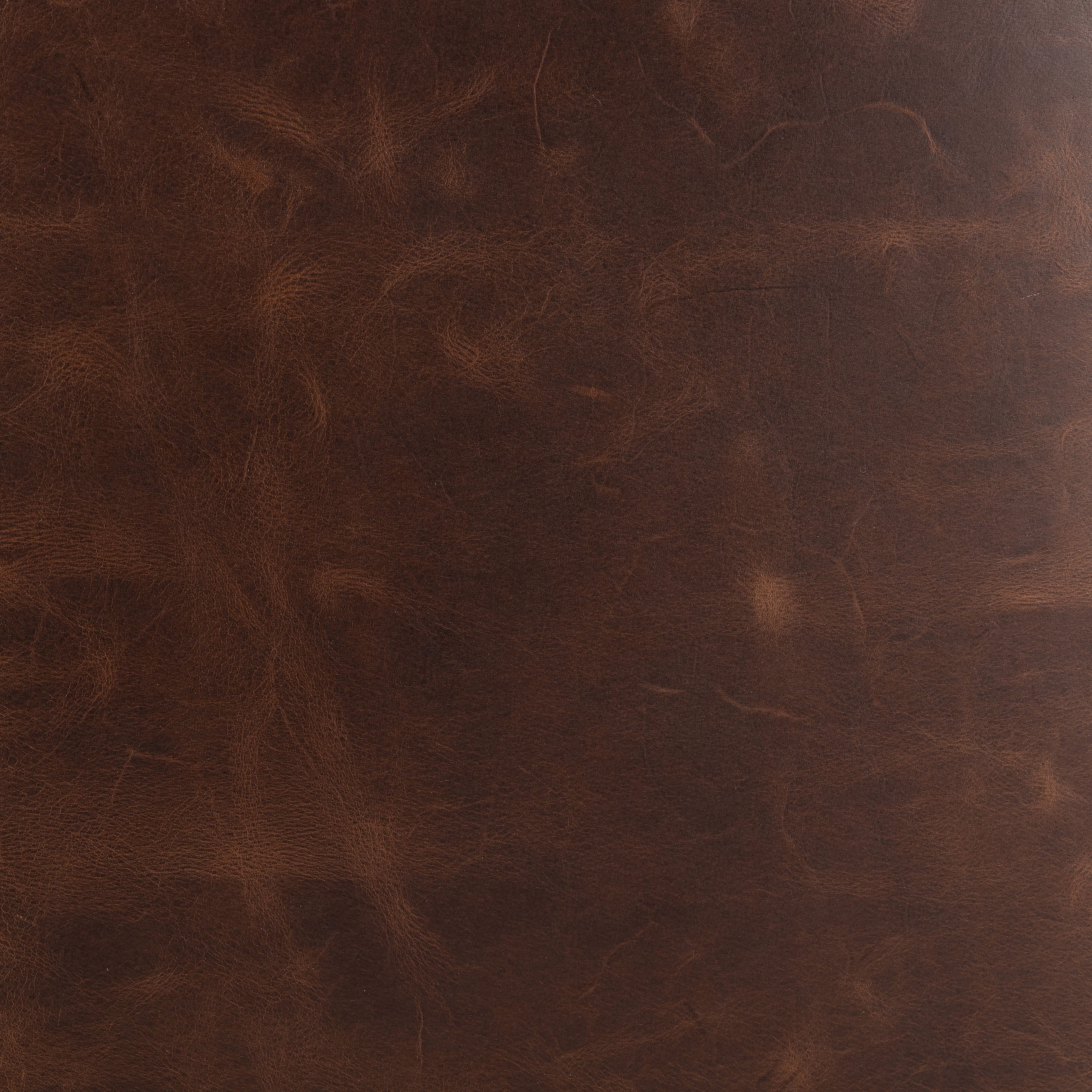 Featuring Paul Raleigh Cigar Swivel Chair by Four Hands at Amethyst Home. Old English-inspired top-grain leather is finished with a soft hand for a vintage, lived-in look on this traditionally inspired chair. Handcrafted in Italy, the richness of this distinctive, full-bodied leather develops an even-richer patina over time. Button tufting texturizes a comfortably curved back. Amethyst Home provides interior design, new construction, custom furniture, and area rugs in the Winter Garden metro area.