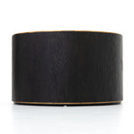 Bring on the drama. An ebony-finished oak top is cut in a starburst texture, framed by deep ebony sides, and encircled by bright brass-clad binding. Amethyst Home provides interior design, new construction, custom furniture, and area rugs in the Seattle metro area.