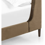 Upholstered in a velvety olive with subtle highs and lows that change in appearance depending on the direction of the fabric's nap. Fixed headboard cushioning for adds texture and comfort, while tapered oak legs lend a low-profile look. Amethyst Home provides interior design, new construction, custom furniture, and area rugs in the Alpharetta metro area.