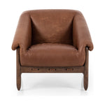 Featuring Reggie Heirloom Sienna Chair by Four Hands at Amethyst Home. Oversized cushioning brings a Brazilian midcentury feel to this vintage-inspired chair. Designed with cushion-wrapped slanted arms, fixed cushioning with a deep sit and narrow legs reminiscent of midcentury style. Sourced from one of the oldest family-owned tanneries in Italy's Bassano del Grappa, heirloom le. Amethyst Home provides interior design, new construction, custom furniture, and area rugs in the Scottsdale metro area.