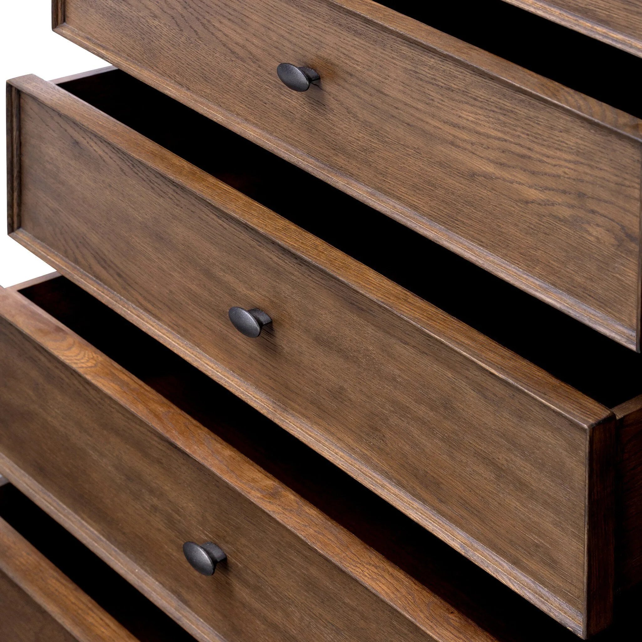 Like an heirloom tallboy with six drawers, this aged oak dresser has room for it all. Detailed with an overhang surface, carved edges top to bottom, angled legs and oval drawer pulls finished in dark gunmetal.Collection: Bolto Amethyst Home provides interior design, new home construction design consulting, vintage area rugs, and lighting in the Laguna Beach metro area.