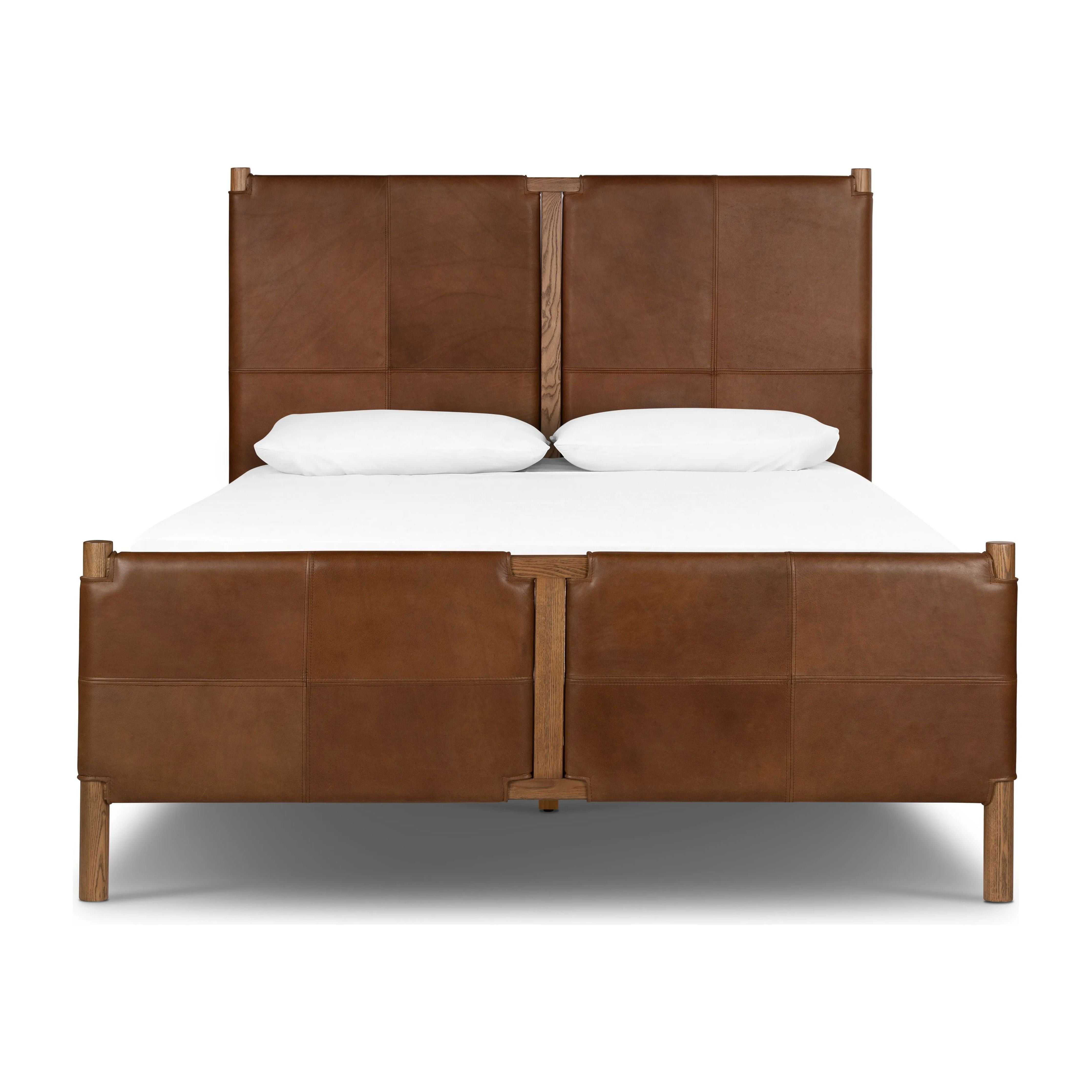 Solid ash framing and heirloom leather panel details craft this safari-inspired bed frame. Sourced from one of the oldest family-owned tanneries in Italyâ€™s Bassano del Grappa, our heirloom leather covering is salvaged and processed from upcycled hides featuring an abundance of natural markings, scars and color variations. Amethyst Home provides interior design, new home construction design consulting, vintage area rugs, and lighting in the Houston metro area.