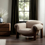 A cozy spot for lounging and curling up with a good book. This statement-making chair features large overflowing cushioning that wraps around the arms and back. Designed with S spring construction and a solid oak frame. Upholstered in a smooth sueded leather with contrasting sling seating strap beneath.Collection: Bin Amethyst Home provides interior design, new home construction design consulting, vintage area rugs, and lighting in the Alpharetta metro area.