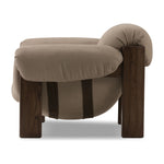 Featuring Samena Nubuck Sand Chair by Four Hands at Amethyst Home. A cozy spot for lounging and curling up with a good book. This statement-making chair features large overflowing cushioning that wraps around the arms and back. Designed with S spring construction and a solid oak frame. Upholstered in a smooth sueded leather with contrasting sling seating s. Amethyst Home provides interior design, new home construction design consulting, vintage area rugs, and lighting in the Des Moines metro area.