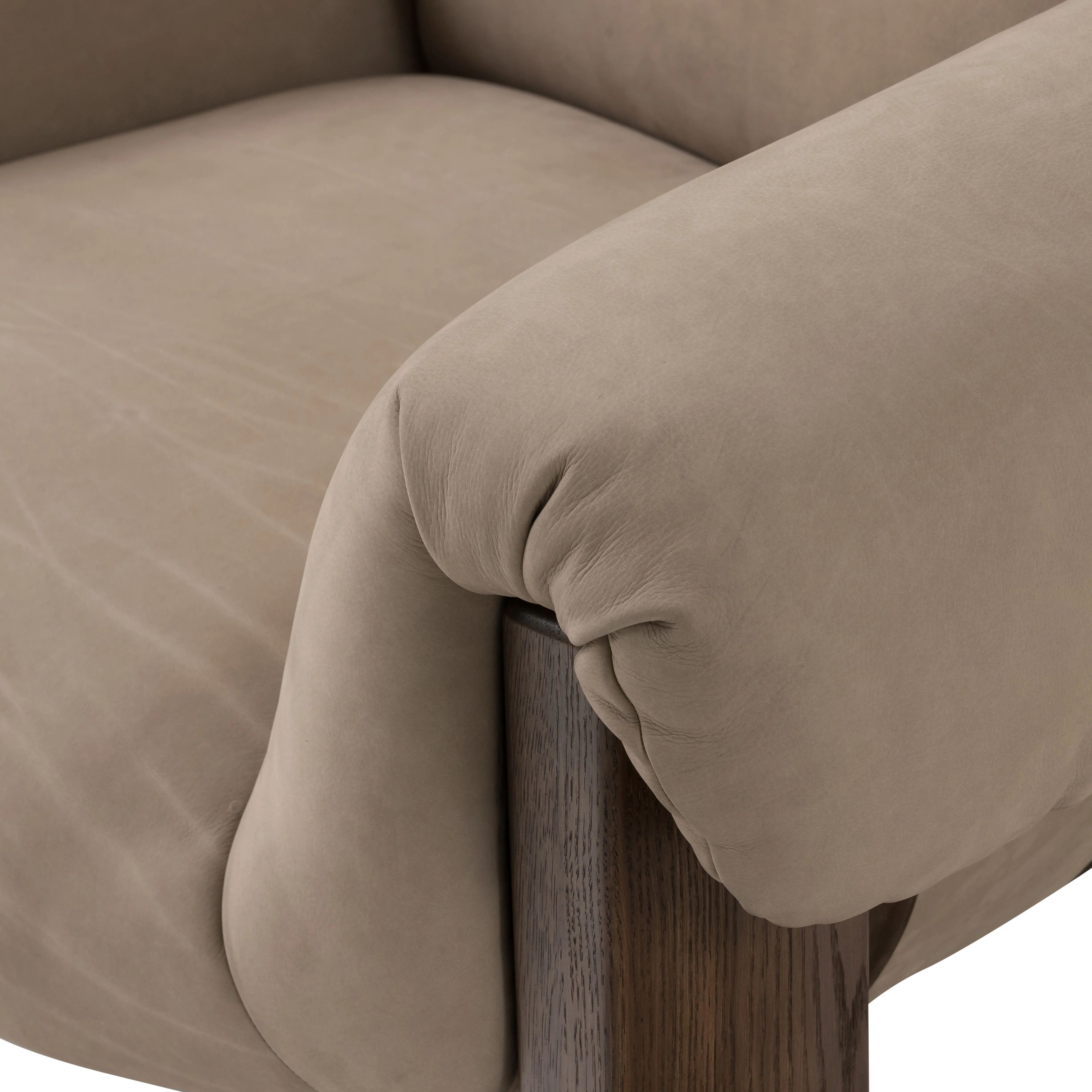 Featuring Samena Nubuck Sand Chair by Four Hands at Amethyst Home. A cozy spot for lounging and curling up with a good book. This statement-making chair features large overflowing cushioning that wraps around the arms and back. Designed with S spring construction and a solid oak frame. Upholstered in a smooth sueded leather with contrasting sling seating strap . Amethyst Home provides interior design, new home construction design consulting, vintage area rugs, and lighting in the Miami metro area.