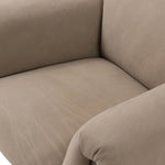 Featuring Samena Nubuck Sand Chair by Four Hands at Amethyst Home. A cozy spot for lounging and curling up with a good book. This statement-making chair features large overflowing cushioning that wraps around the arms and back. Designed with S spring construction and a solid oak frame. Upholstered in a smooth sueded leather with contrasting sling seating str. Amethyst Home provides interior design, new home construction design consulting, vintage area rugs, and lighting in the Portland metro area.