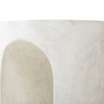 Made from textured white concrete, a cylinder shaped end table features a pill-shaped cutout for a light look. Subtle mottling adds a hint of texture.Collection: Chandle Amethyst Home provides interior design, new home construction design consulting, vintage area rugs, and lighting in the San Diego metro area.