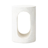Featuring Samson Textured Lunar Concrete End Table by Four Hands at Amethyst Home. Made from textured white concrete, a cylinder shaped end table features a pill-shaped cutout for a light look. Subtle mottling adds a hint of texture.Collection: ChandlerColors: Textured Lunar ConcreteMaterials: Concrete Weight: 37.48 lbs. Amethyst Home provides interior design, new home construction design consulting, vintage area rugs, and lighting in the Washington metro area.