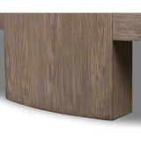 A simple stunner. This large coffee table features exposed joinery from five thick, gently curved legs. Crafted from a beautiful oak veneer with exposed graining throughout.Collection: Irondal Amethyst Home provides interior design, new home construction design consulting, vintage area rugs, and lighting in the Houston metro area.