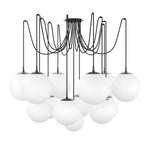 Featuring Spider Black Gunmetal Opal Matte Glass Cord Chandelier by Four Hands at Amethyst Home. Matte glass spheres float at varying lengths for a statement-making piece. Each globe is individually blown, shaped and sculpted by hand through a one-hour process. Matte glass is specially manufactured to evenly diffuse light. The finish on the brass frame is achi. Amethyst Home provides interior design, new home construction design consulting, vintage area rugs, and lighting in the Austin metro area.