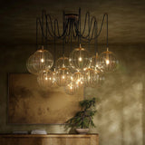 Featuring Spider Burnished Brass Clear Ribbon Glass Cord Chandelier by Four Hands at Amethyst Home. Clear glass spheres float at varying lengths for a statement-making piece. Each globe is individually blown, shaped and sculpted by hand through a one-hour process. Brass and glass are 98% recyclable. Designed and sustainably crafted in Poland by Schwung.
Overall. Amethyst Home provides interior design, new home construction design consulting, vintage area rugs, and lighting in the Miami metro area.