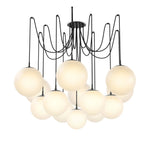 Featuring Spider Black Gunmetal Opal Matte Glass Cord Chandelier by Four Hands at Amethyst Home. Matte glass spheres float at varying lengths for a statement-making piece. Each globe is individually blown, shaped and sculpted by hand through a one-hour process. Matte glass is specially manufactured to evenly diffuse light. The finish on the brass frame . Amethyst Home provides interior design, new home construction design consulting, vintage area rugs, and lighting in the Newport Beach metro area.