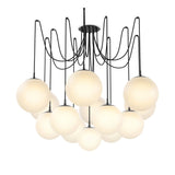 Featuring Spider Black Gunmetal Opal Matte Glass Cord Chandelier by Four Hands at Amethyst Home. Matte glass spheres float at varying lengths for a statement-making piece. Each globe is individually blown, shaped and sculpted by hand through a one-hour process. Matte glass is specially manufactured to evenly diffuse light. The finish on the brass frame . Amethyst Home provides interior design, new home construction design consulting, vintage area rugs, and lighting in the Newport Beach metro area.