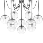 Featuring Spider Black Gunmetal Clear Ribbon Glass Cord Chandelier by Four Hands at Amethyst Home. Clear glass spheres float at varying lengths for a statement-making piece. Each globe is individually blown, shaped and sculpted by hand through a one-hour process. The finish on the brass frame is achieved through a specialized process that turns the brass i. Amethyst Home provides interior design, new home construction design consulting, vintage area rugs, and lighting in the Scottsdale metro area.
